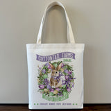 a tote bag with a picture of a rabbit on it