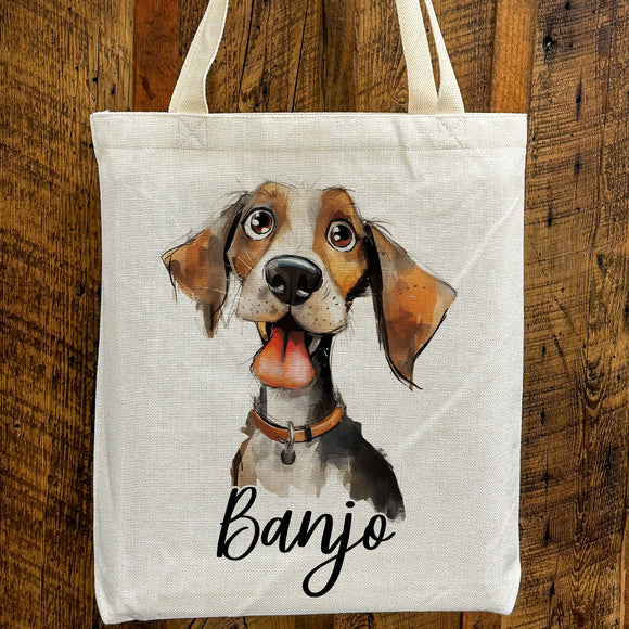 a brown and white dog with its tongue hanging out of a bag