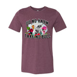 heather maroon shirt wiht a highland cow with horns and vintage flowers that says do no harm take no bull