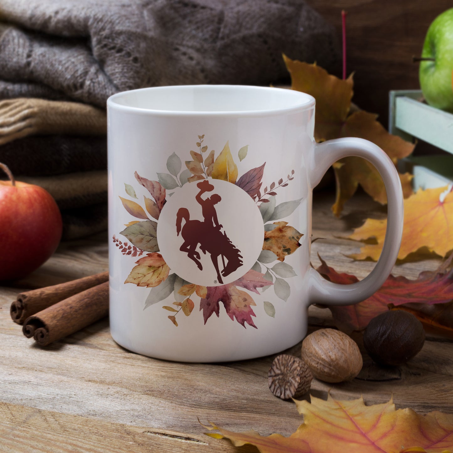officially licensed Wyoming Bucking Horse™ mug, autumn leaves coffee mug, western fall drinkware, rustic Wyoming mug, cowboy seasonal mug, Bucking Horse™ ceramic mug, Wyoming fall gift