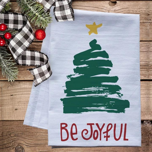 a tea towel with a christmas tree on it