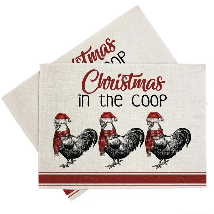 three christmas napkins with roosters on them