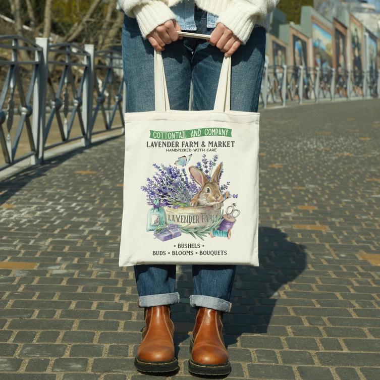 a person holding a bag with a picture of a rabbit on it