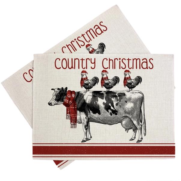 a couple of napkins with a cow and chickens on them