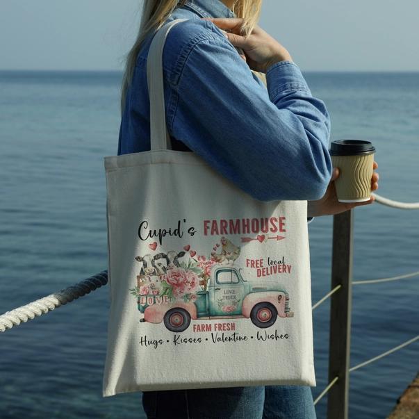 a woman holding a coffee cup and a tote bag