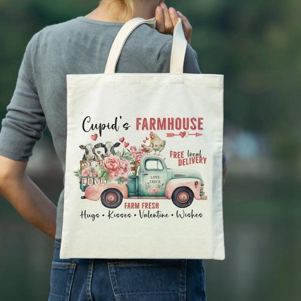 a woman carrying a shopping bag with a picture of a truck