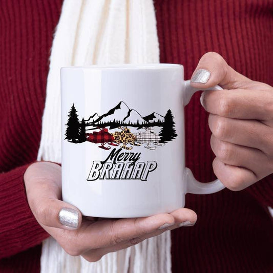 a woman holding a white coffee mug with the words happy brahma on it