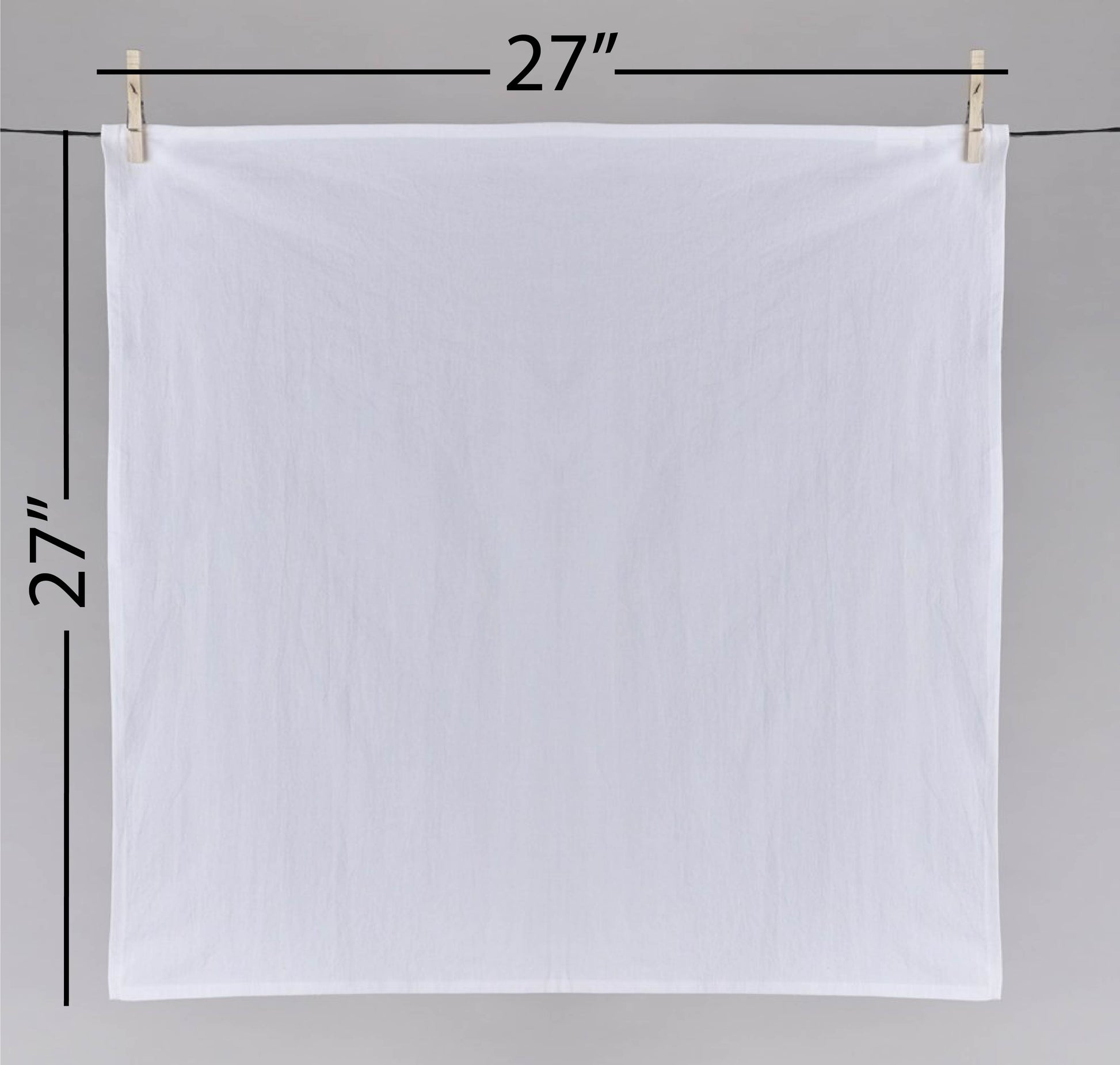 a white cloth hanging on a clothes line