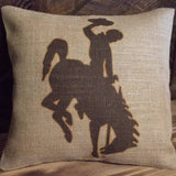 Brown & Gold Wyoming Cowboy and bucking horse textured linen canvas throw pillow - Wyoming steamboat logo WYO Cowboy state pride pillow