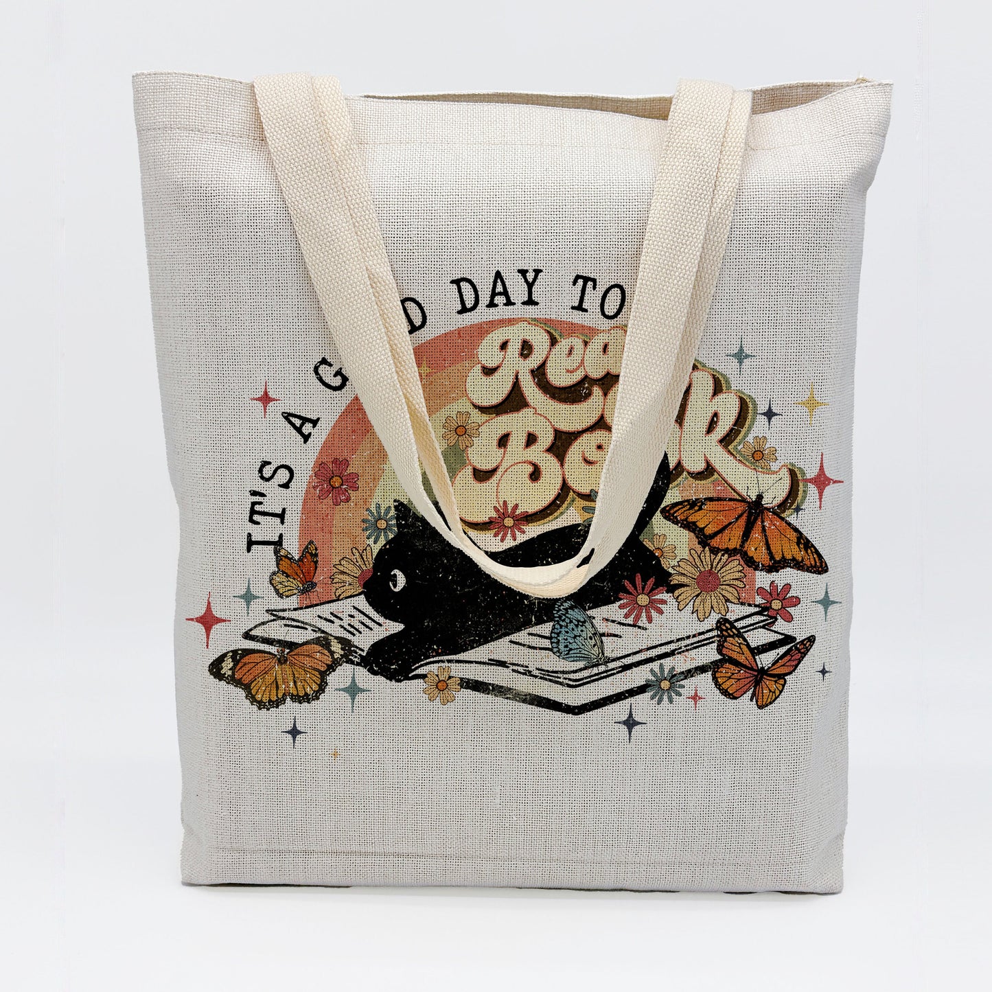 a tote bag with a dog and butterflies on it